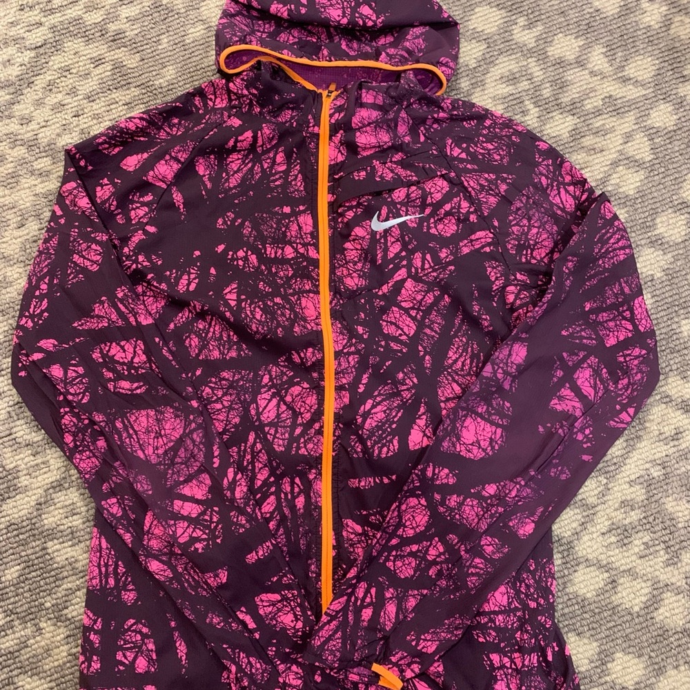 Size Small Woman’s Nike ultra lightweight running jacket.